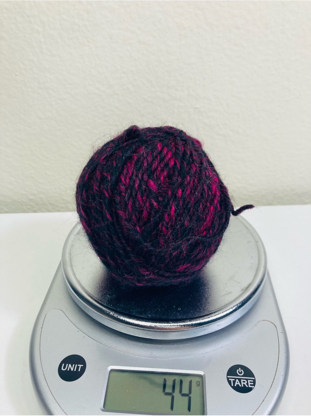Bargain Yarn Discount: Black and Magenta Twisted Wool Yarn Ball